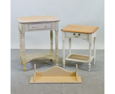 A cream painted side table, 60cm,  together with another similar and a wall shelf