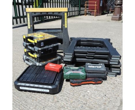 A collection of six Stanley saw horses, together with four boxes of screws and nails, a tile saw, drill bits and attachments