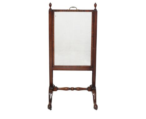 A mahogany cheval mirror , first quater 19th century  A mahogany cheval mirror  , first quater 19th century, with urn finials