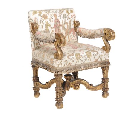A Continental carved giltwood and tapestry upholstered armchair  A Continental carved giltwood and tapestry upholstered armch