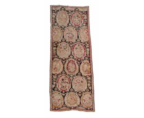 A Persian runner, probably Bakhtiar, the dark field decorated with multiple...  A Persian runner, probably Bakhtiar,   the da
