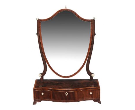 A George III mahogany serpentine fronted dressing mirror , circa 1780  A George III mahogany serpentine fronted dressing mirr