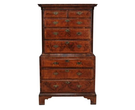 A George II walnut and featherbanded chest on chest, circa 1740  A George II walnut and featherbanded chest on chest,   circa