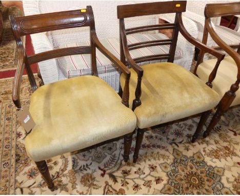Four various early 19th century mahogany barback elbow chairs, each with pale fabric upholstered stuffover seats, on ring tur