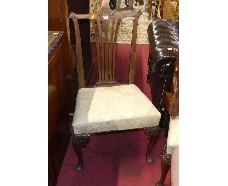 A pair of 19th century mahogany Heppelwhite style dining chairs, with cream floral silk upholstered stuffover seats; together