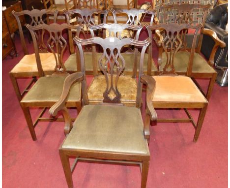 A set of eight early 20th century mahogany Chippendale style splat back dining chairs, each having green dralon upholstered d