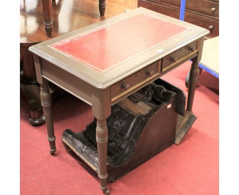 A Victorian and later grey painted and gilt tooled red leather inset small two drawer writing table, raised on ring turned su