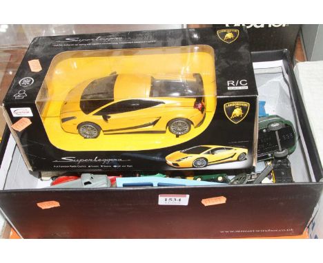 A box of mixed diecast to include Dinky 00 Bedford lorry, Dinky Supertoys TV roving eye, Matchbox model Lamborghini RC car an