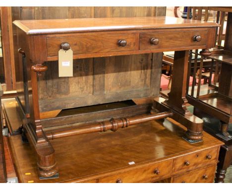 A Victorian walnut two drawer hall table, raised on squat turned supports united by ring turned central stretcher, w.103cm 