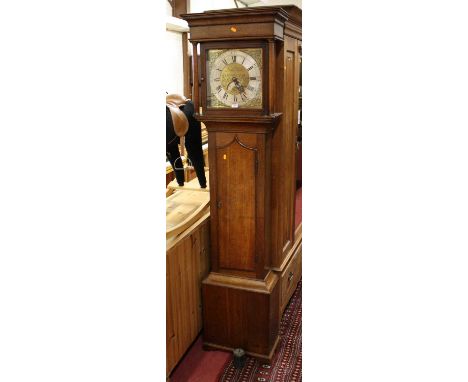 A circa 1800 provincial oak and mahogany crossbanded longcase clock, the silvered and brass dial signed Nathaniel Kirk Kibwor