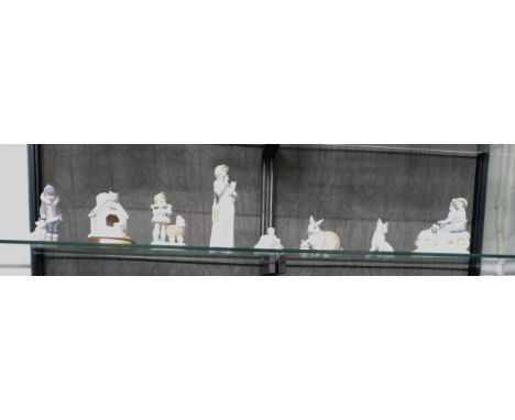 A Lladro figure of a girl with baby, Polar Bear 14.5cm, Romano girl with kitten 22cm, Leonardo Fido's kennel 11cm, with circu