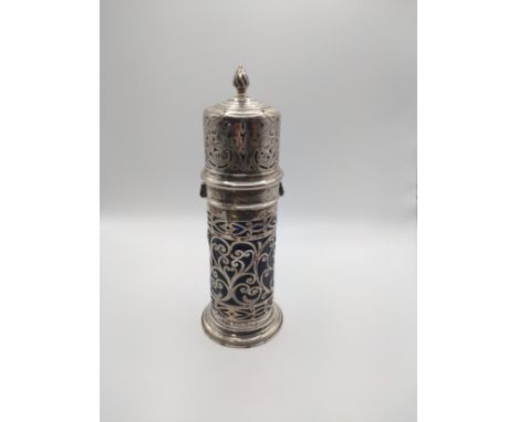 A silver sugar sifter, with pierced decoration, and blueglass liner, dated London 1904, bearing makers marks for Haseler Brot