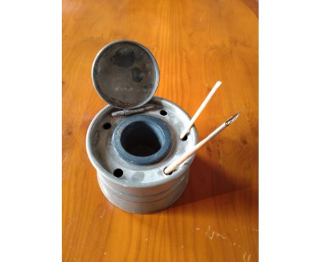 An inkwell and quills 