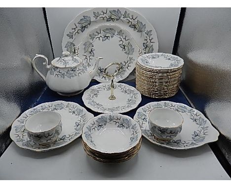 Royal Albert 'silver maple' part tea set comprising of 22 side plates, 16 saucers, 13 cups, cake stand, cake serving plate, p