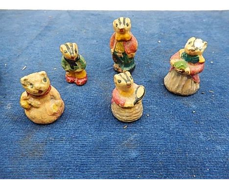 vintage miniature ceramic family of badgers and a cat 