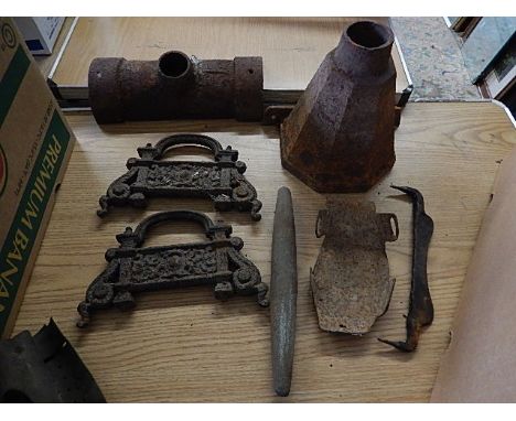 vintage cast iron drainage hopper and gutter outlet, cast iron boot scraper supports, scythe rub stone and leather pouch