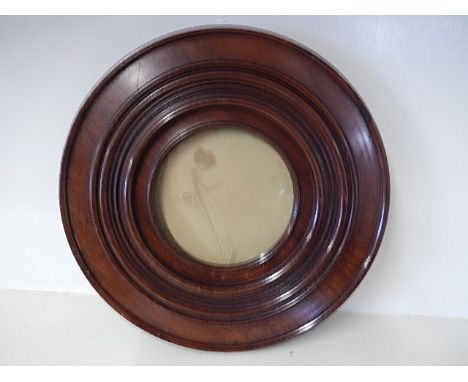 printed portrait of a lady in round mahogany frame25cm 
