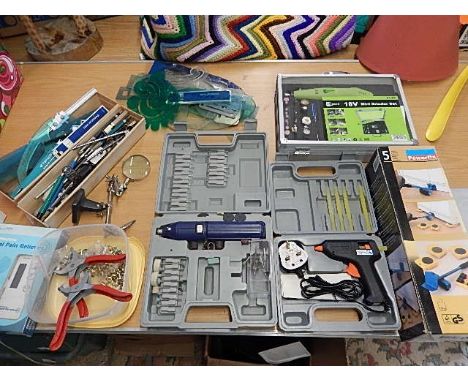 assorted tools to include draughtsman tools, mini grinder set, glue gun, rivet gun set etc