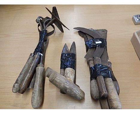 vintage farm tools: dibber, hoe's and knives used for celery cutting