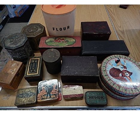 collection of tins and boxes including a tea caddy and retro flour bin