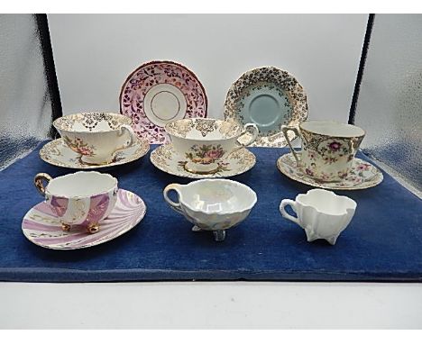 collection of cabinet cups and saucers