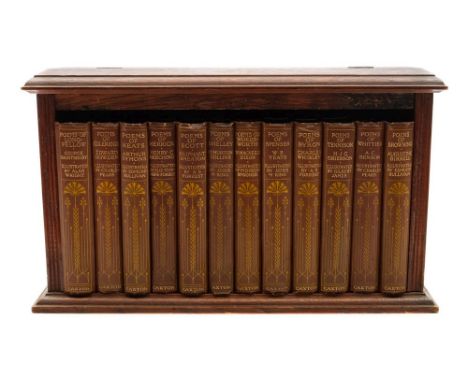 THE GOLDEN POETS : a set of twelve volumes in original art nouveau designed cloth, 8vo, contained within contemporary oak boo