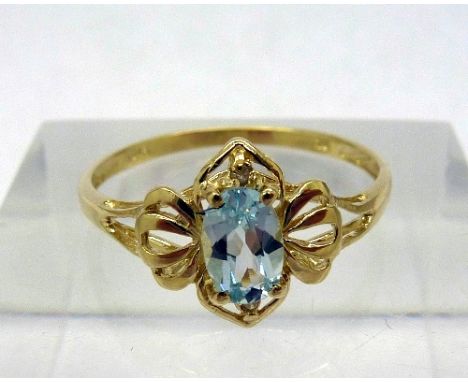 A 9ct gold, blue topaz and diamond ring, weight 1.1g, size O