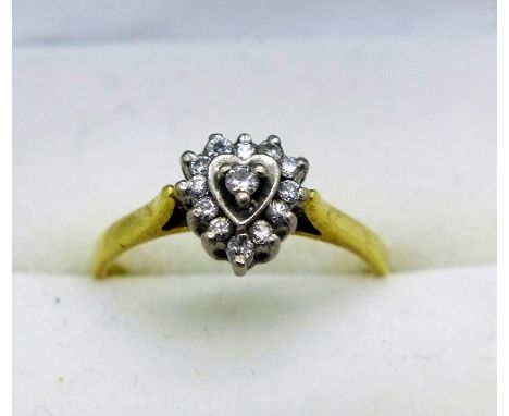 An 18ct gold heart shaped diamond cluster ring, weight 2.4g, size L