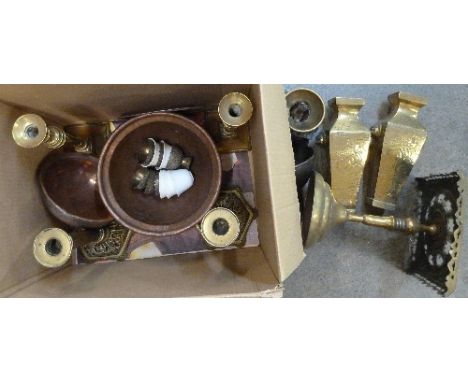 Two pairs of brass candlesticks, a trivet, a coffee grinder, a pair of brass vases, a funnel, etc.
