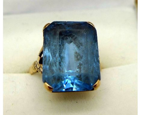 A 9ct gold and blue stone ring, weight 5.2g, size K