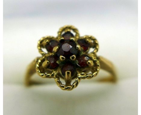 A 9ct gold and garnet ring, weight 2.4g, size N