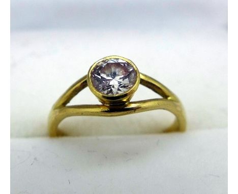 An 18ct gold solitaire diamond ring, weight 1.8g, approximately 0.33ct diamond weight, size E