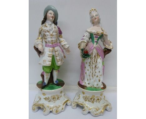 A pair of continental figural lamp bases, a/f, height 30cm
