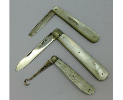Two silver and mother of pearl pocket knives and a hook