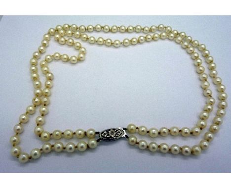 A 9ct gold and pearl double row necklace