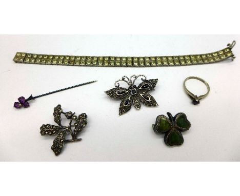 Three silver brooches, a ring, a pin and a bracelet, weight 39.1g