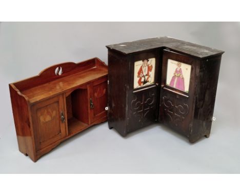 A walnut and stylised floral inlaid hanging cupboard, early 20th century, with pierced gallery, above central vacant shelf fl