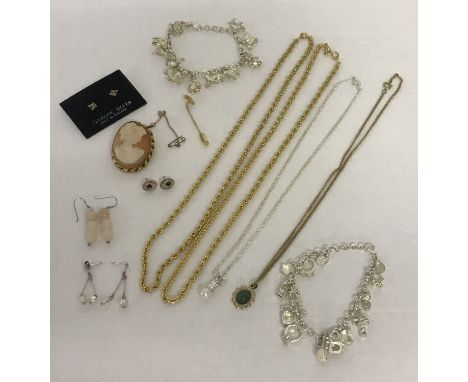 A small collection of costume and silver jewellery. To include: silver St Bernard dog earrings, initial R silver earrings, ro