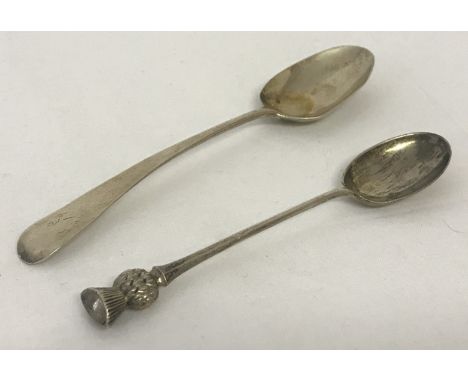 A Georgian silver teaspoon hallmarked Thomas Dicks, London 1815. Together with a silver teaspoon with thistle finial, hallmar