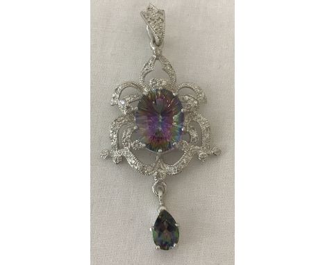 A 925 silver, Art Nouveau style drop pendant, set with mystic topaz and surrounded by clear stones.  Approx. 5.5cm long.
