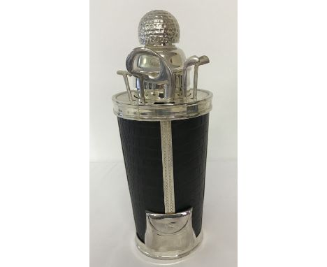 A novelty silver plated &amp; leather effect cocktail shaker &amp; tools in the shape of a golf bag. 4 cocktail stirrers in t