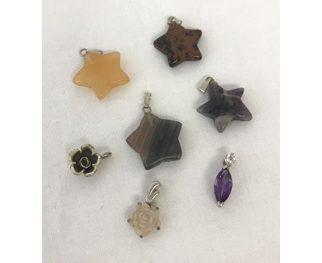 7 silver and white metal pendants most set with natural or semi precious stones. Comprising: carved pale pink shell in shape 