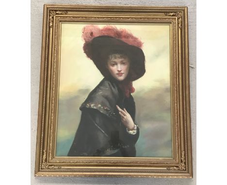 A large gilt framed and glazed portrait of a woman in period dress.  Frame size approx. 74 x 64 cm.