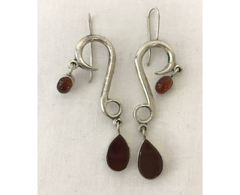 A pair of large contemporary style drop earrings in 925 silver set with cornelian stones.  Approx. 7cm long.