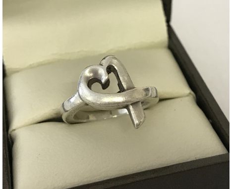 A silver Tiffany &amp; Co "Loving heart" ring by Paloma Picasso. Size I½. Total weight approx. 4.3g.