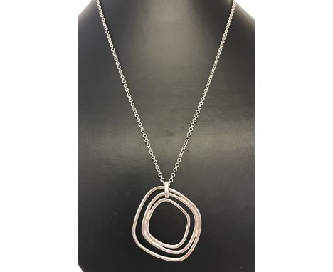 A modern design silver pendant on a 18 inch belcher chain by Jasper Conran. 925 mark to pendant, clasp of chain and designers