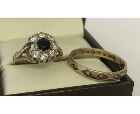 2 vintage 9ct gold rings both with missing stones. A sapphire and clear stone dress ring, one clear stone missing together wi