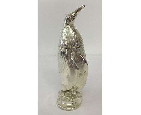 A heavy silver plated novelty penguin shaped sugar sifter.  Approx. 18.5cm tall.
