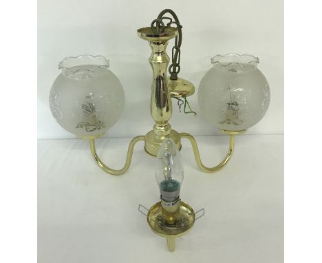 A vintage brass 3 arm ceiling light fitting with etched glass shades. one shade missing. 