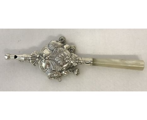 A 925 silver babies rattle with whistle head and mother of pearl handle. Decorative body with angel detail (one bell missing)